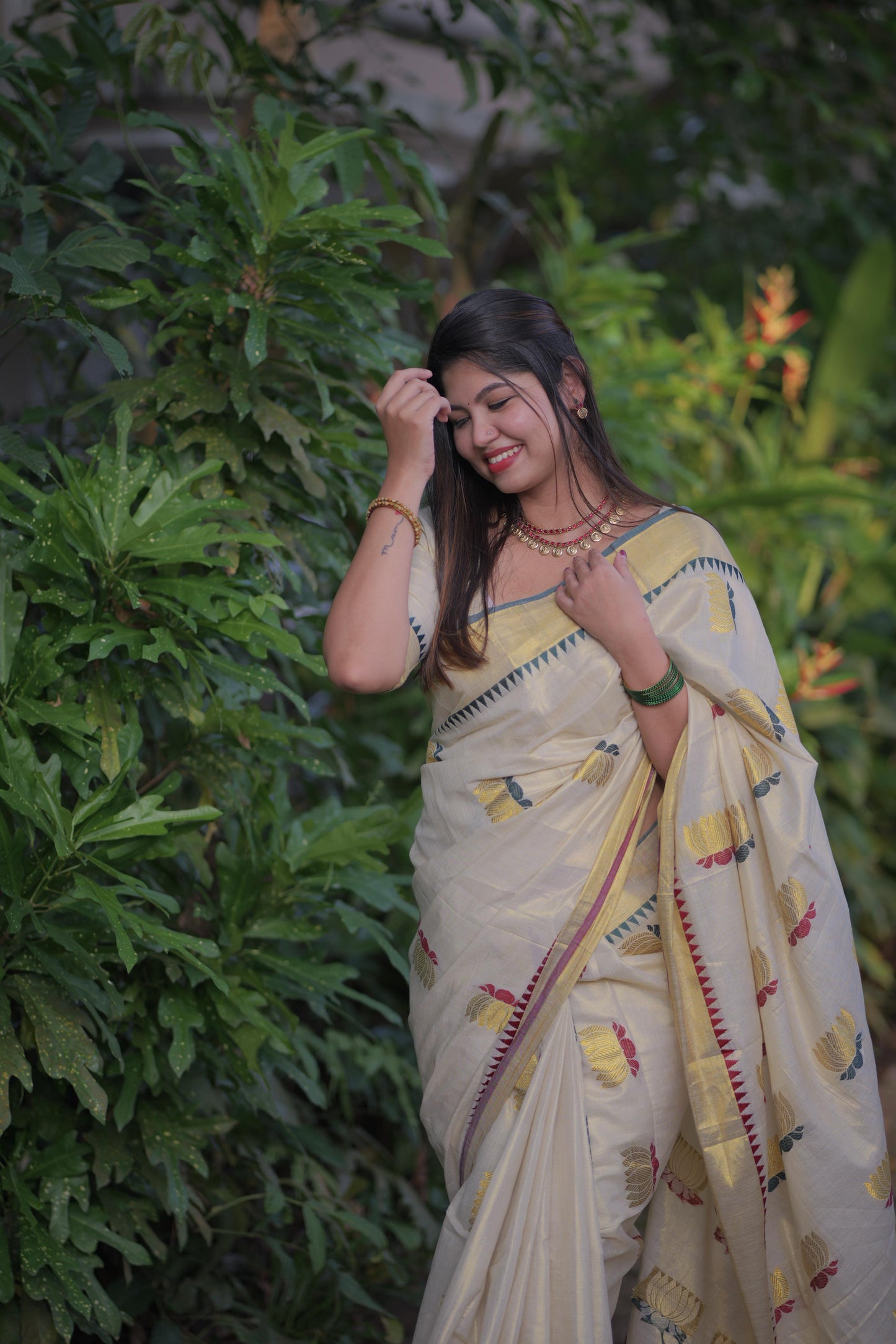 Lotus weave golden tissue saree with temple borders