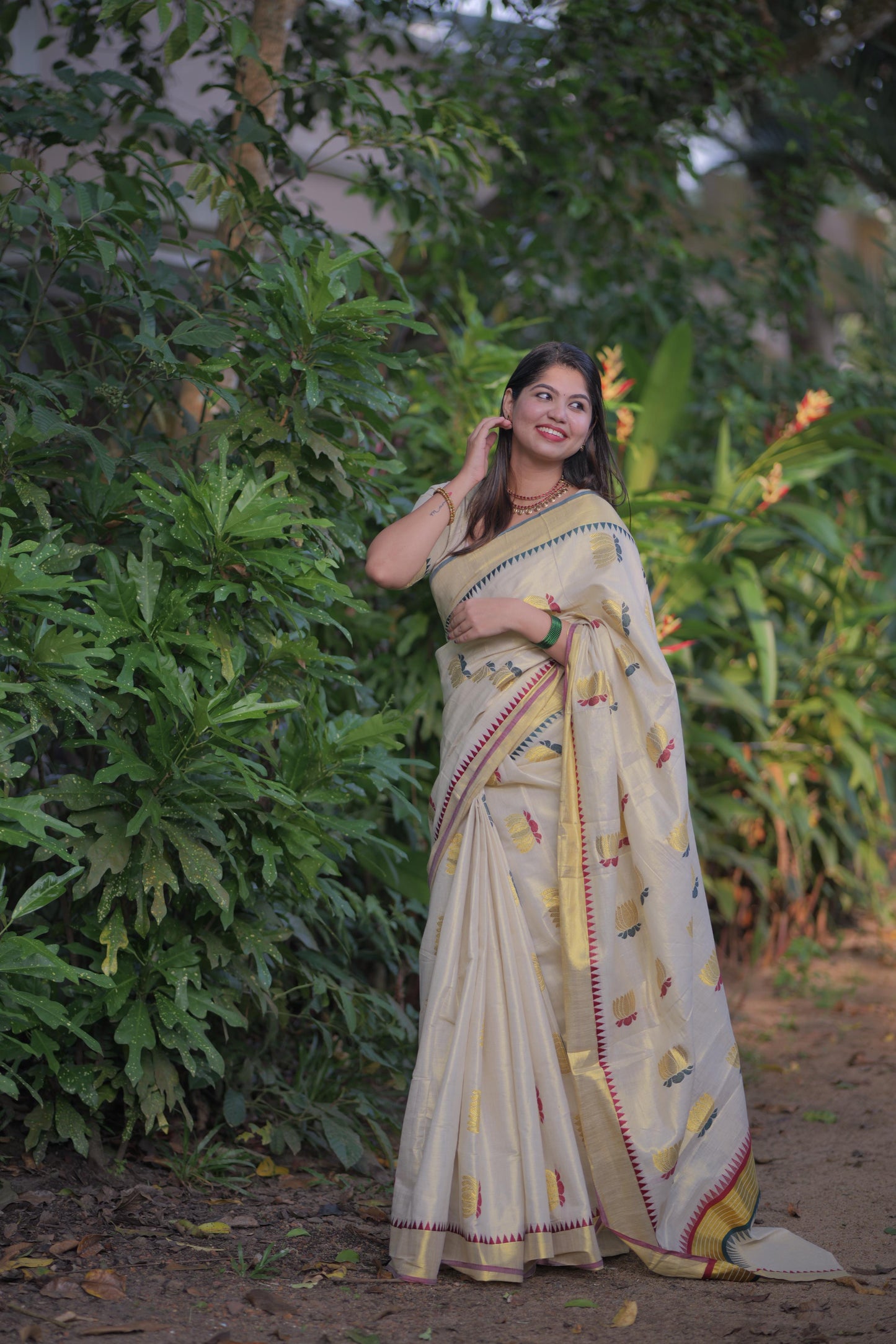 Lotus weave golden tissue saree with temple borders