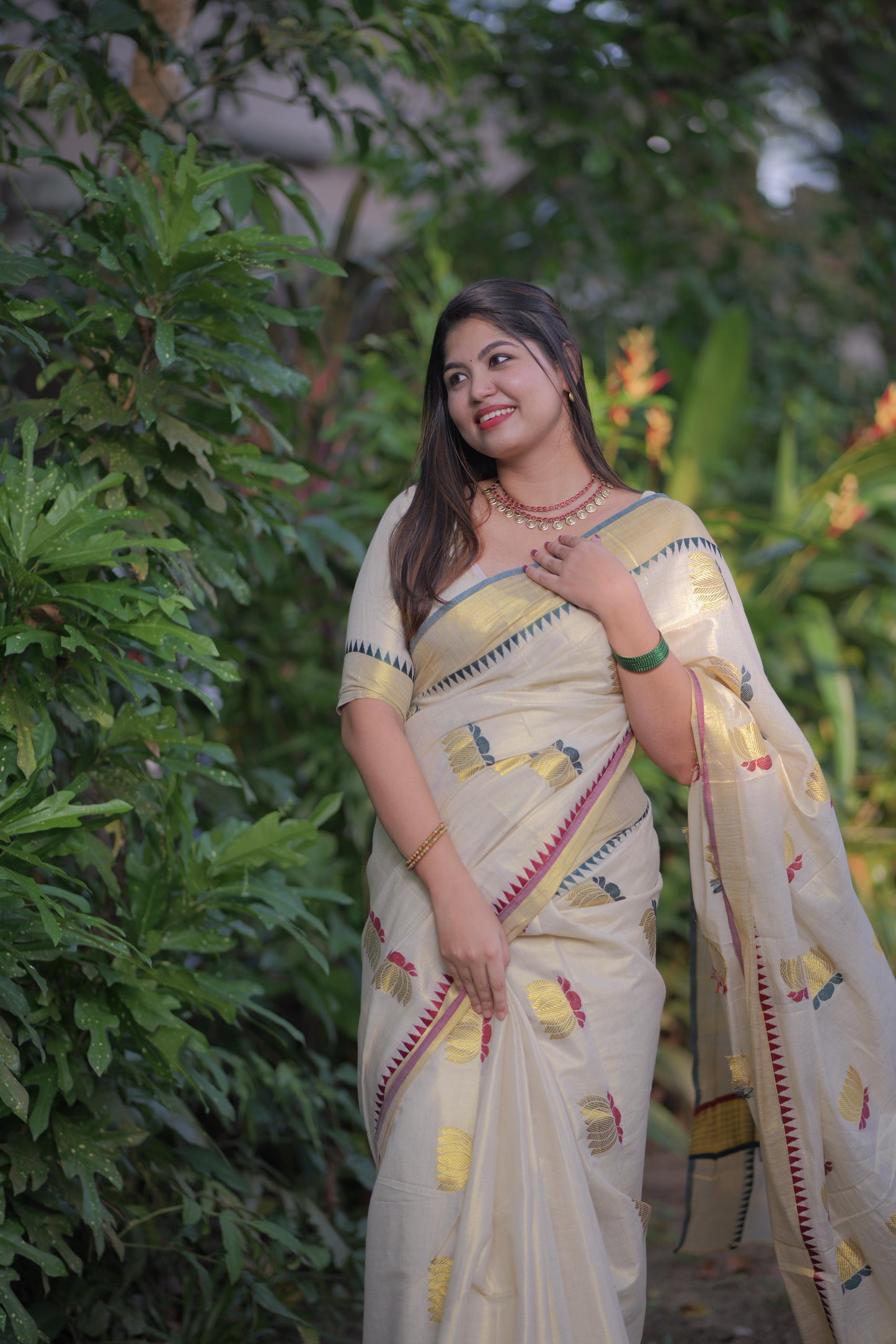 Lotus weave golden tissue saree with temple borders