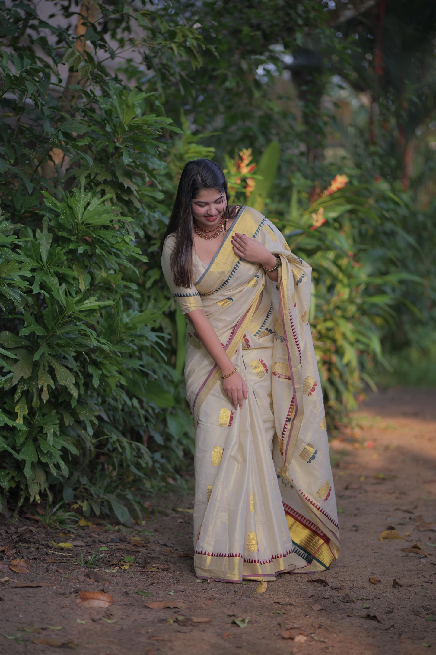 Lotus weave golden tissue saree with temple borders